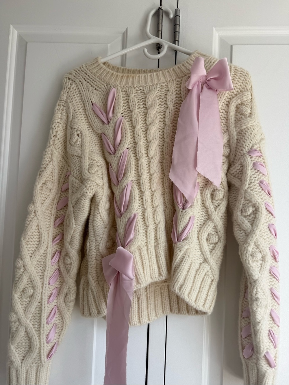 LoveShackFancy Cream Cable-Knit Sweater with Pink Ribbon Bows